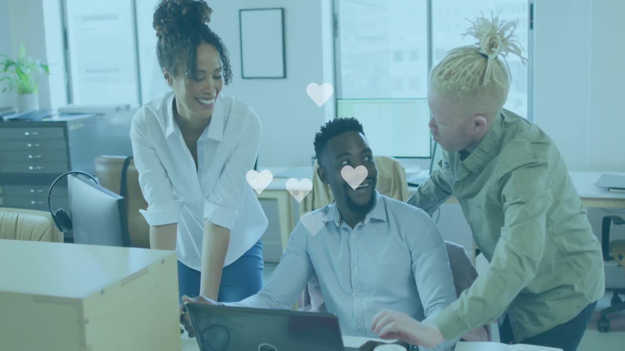 Animation of hearts over business people in office