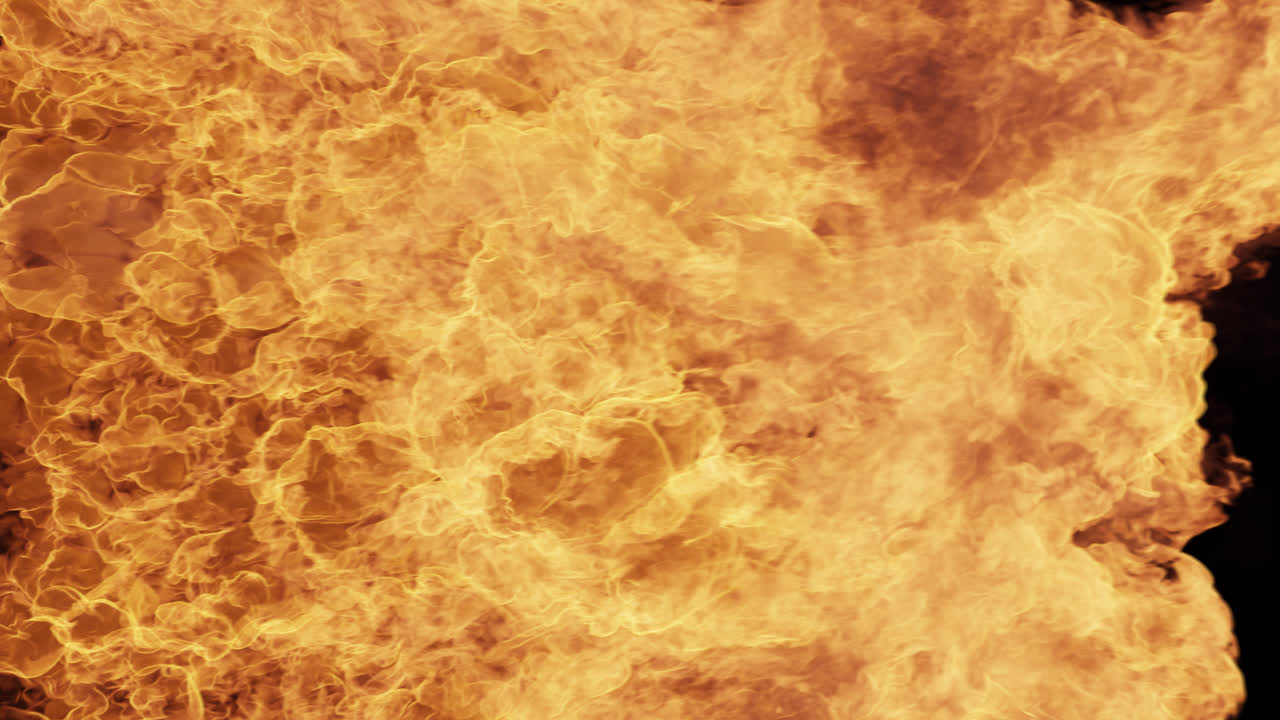 Dynamic Flames Expanding on Black Background