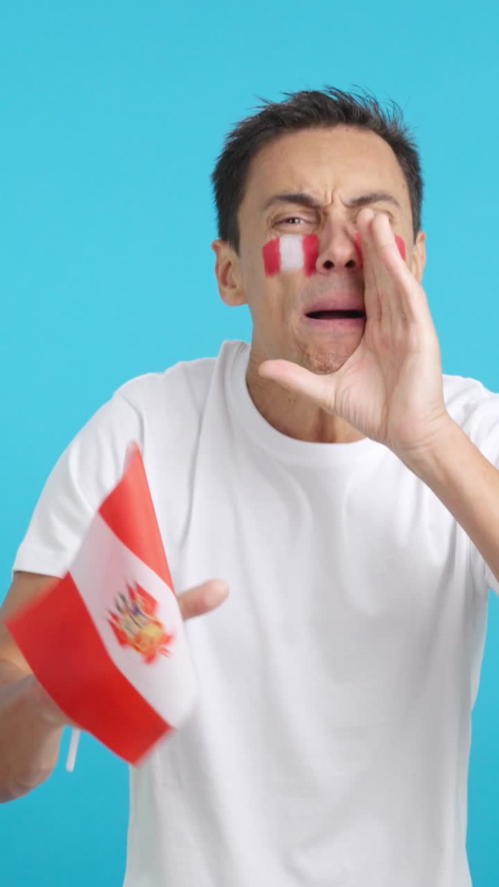 Man cheering for Peru during a match that is lost