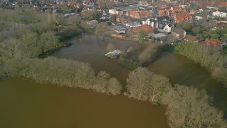 flooded house on the riverbank in meppen, germany