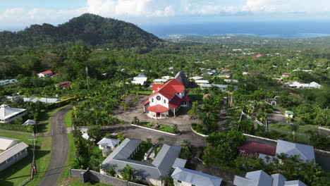 aerial panoramic view of upolu island with a town church in samoa