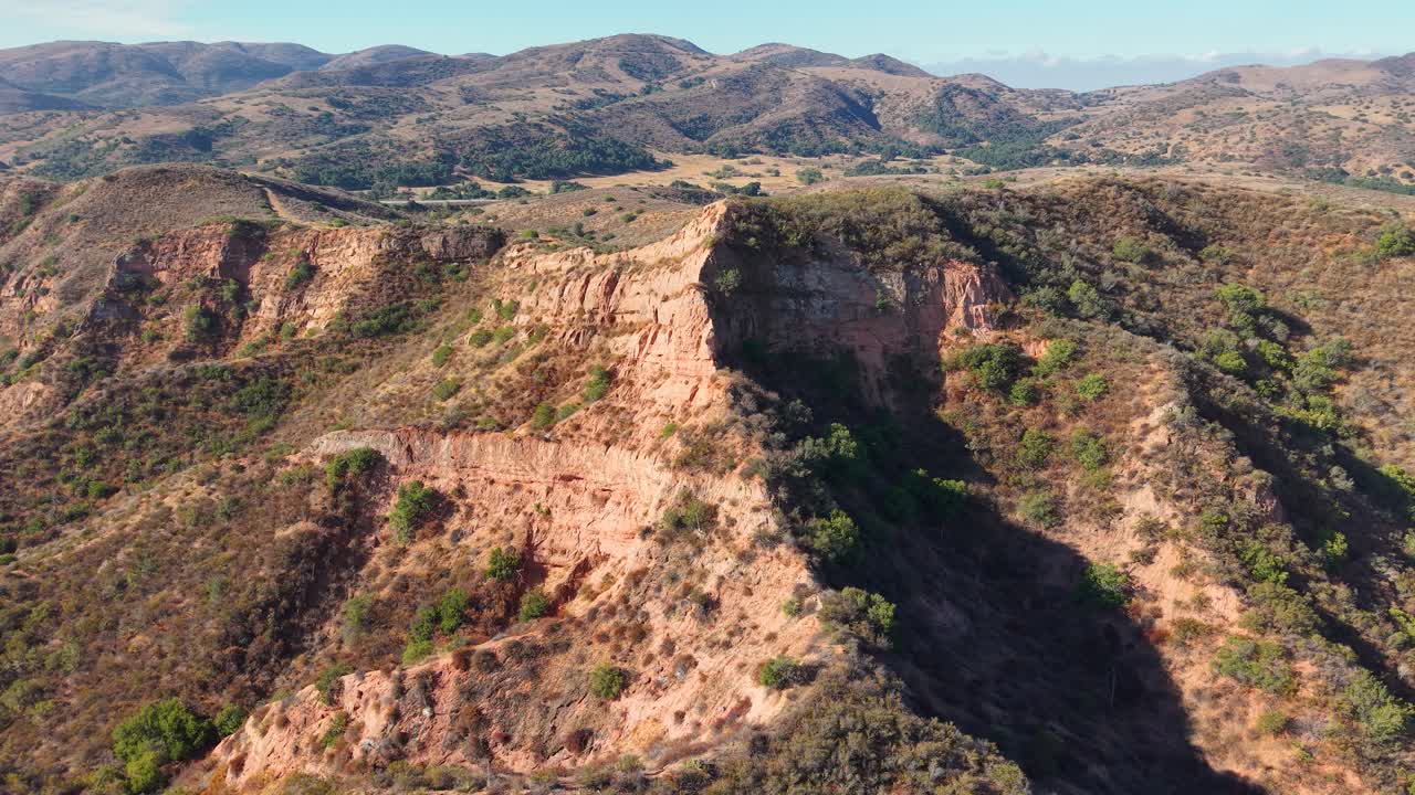 Drone view of sharp canyon ridges in Black Star Canyon, California, with deep shadows highlighting the dramatic terrain
