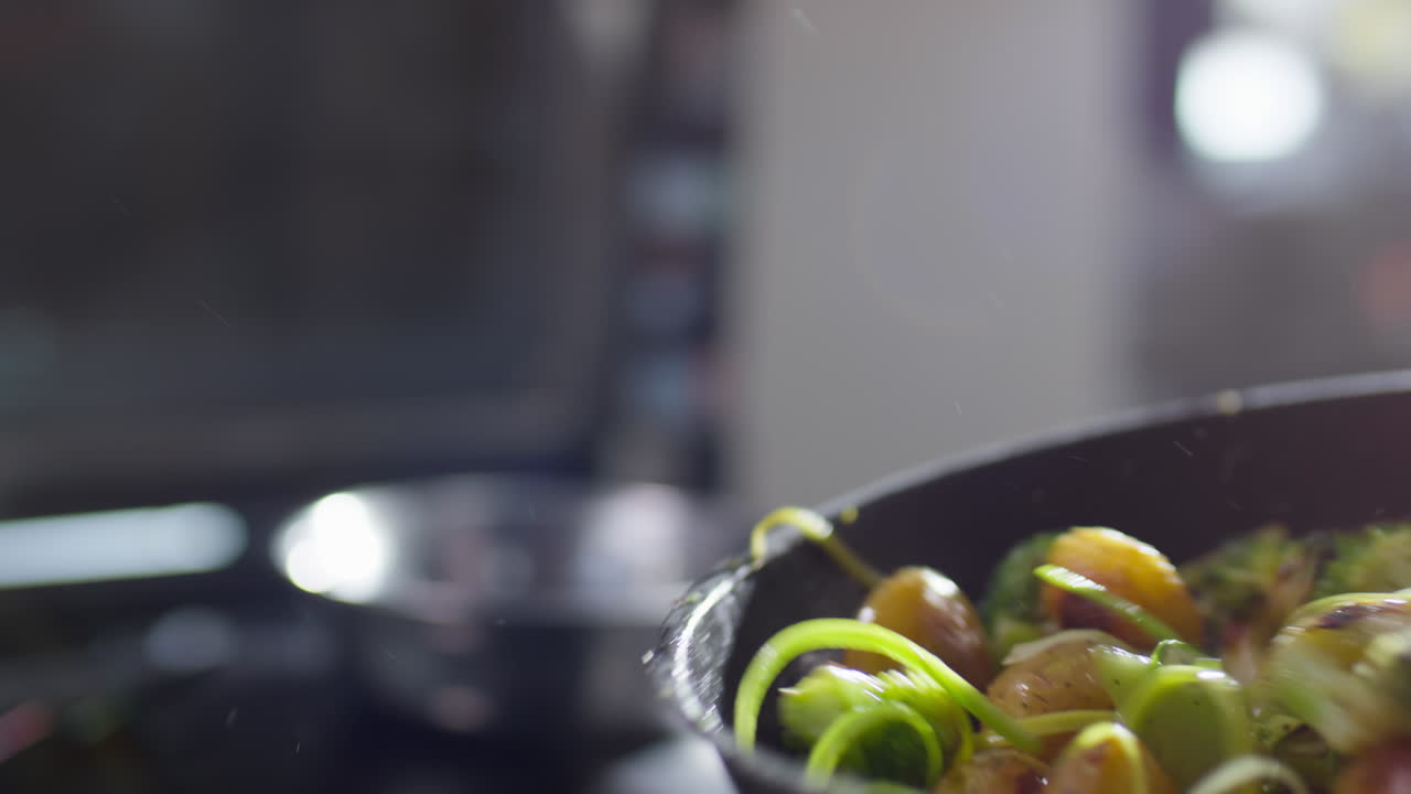 Tossing Food on Skillet