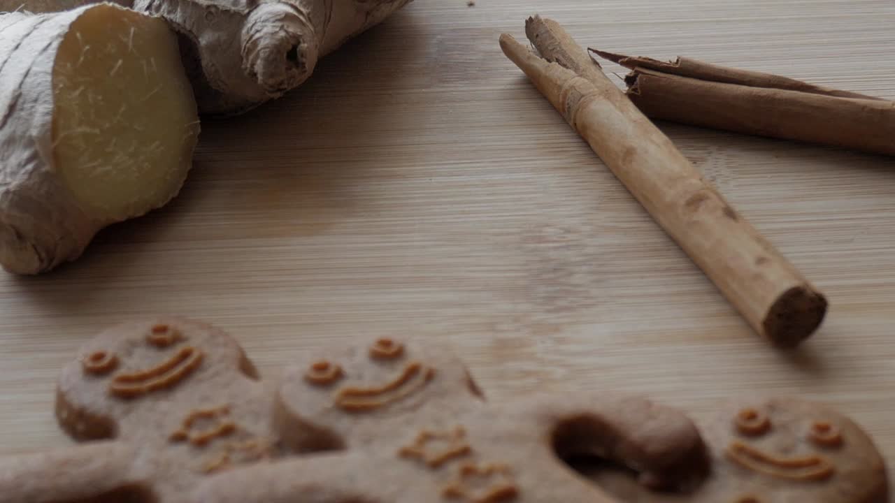 Close-up of ginger, vanilla and gingerbread men on a table. Top-down