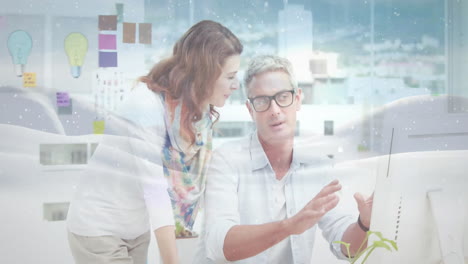 in office, business professionals collaborating on animation and creative ideas digitally