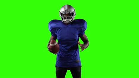 african american football player on green screen background.