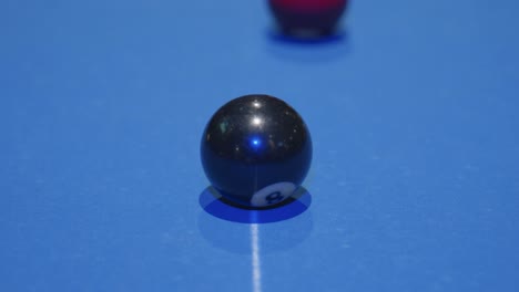 white ball opens snooker game and camera zooms in on black ball