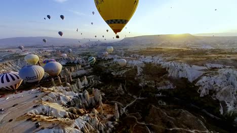 gaze upon cappadocia’s surreal landscape from a hot air balloon at sunrise—a truly mesmerizing view