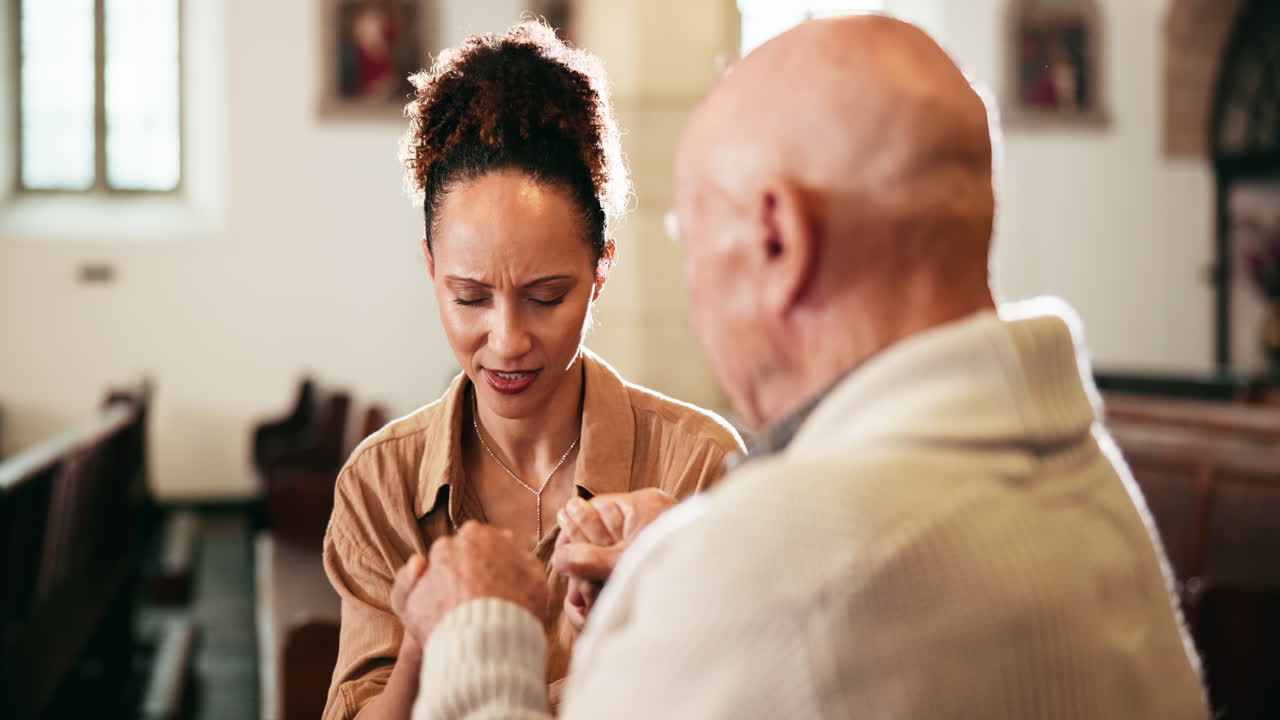 Couple Praying Together in Church