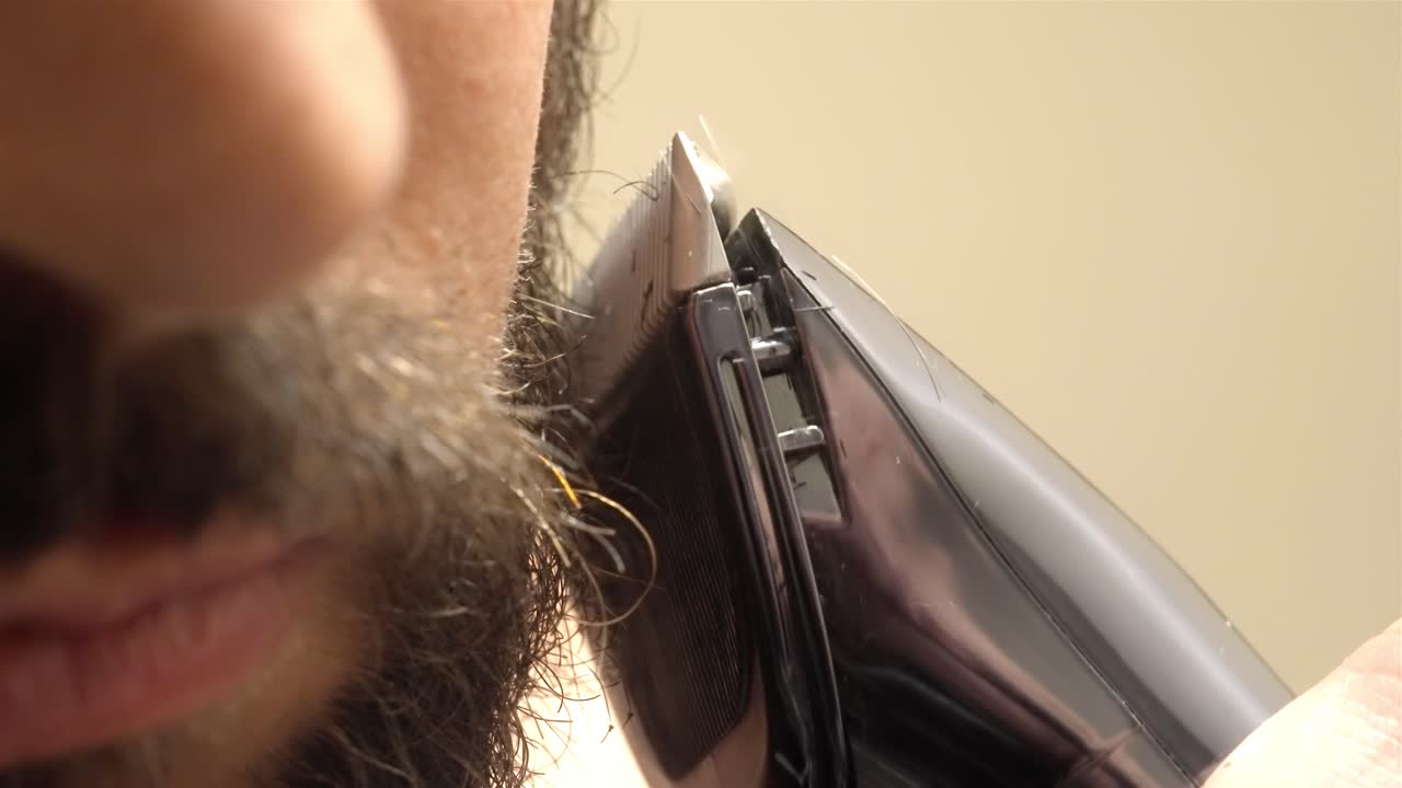 Man Shaving Beard with Razor in 4K, Close Up