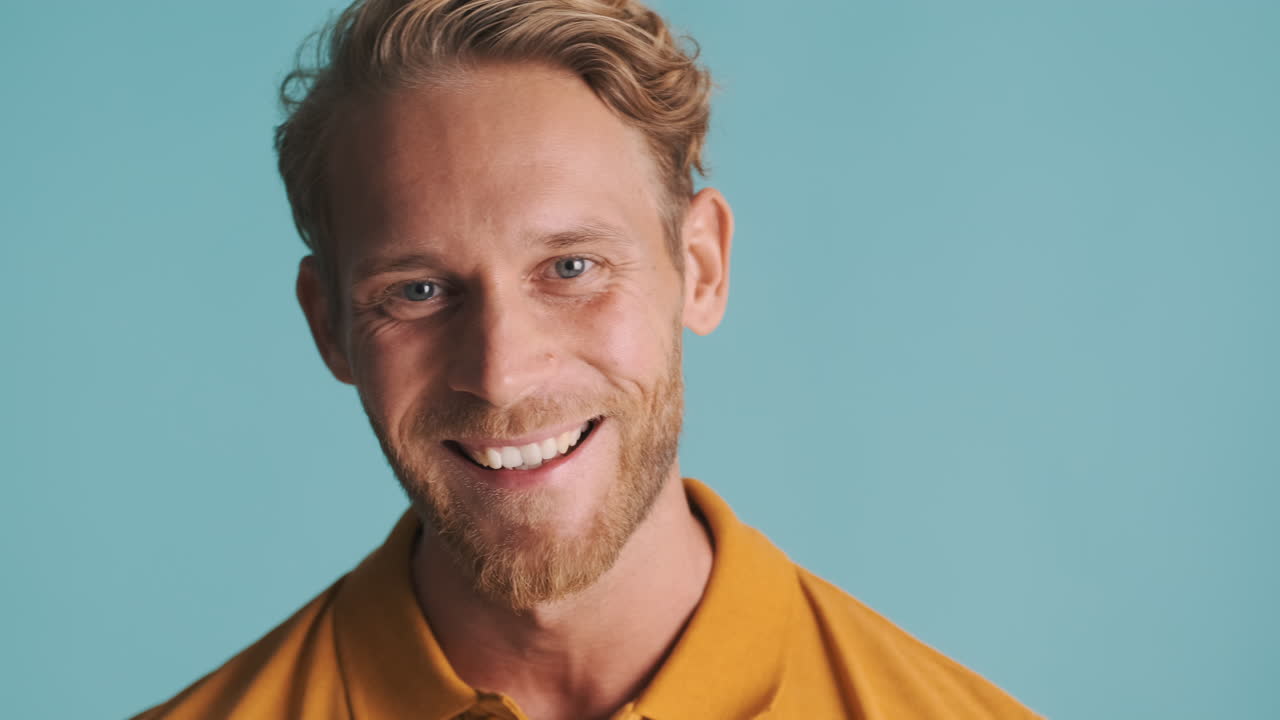 Amazed man having a good time posing