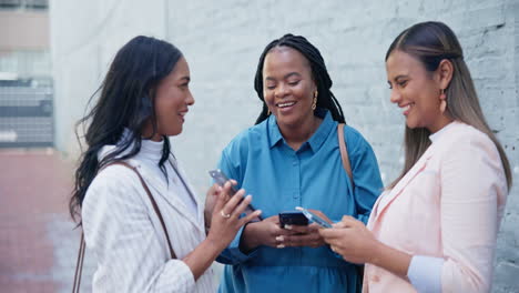 friends, women outside office with phone