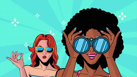 dos mujeres mirando a través de binoculares