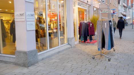 clothing store display on a city street