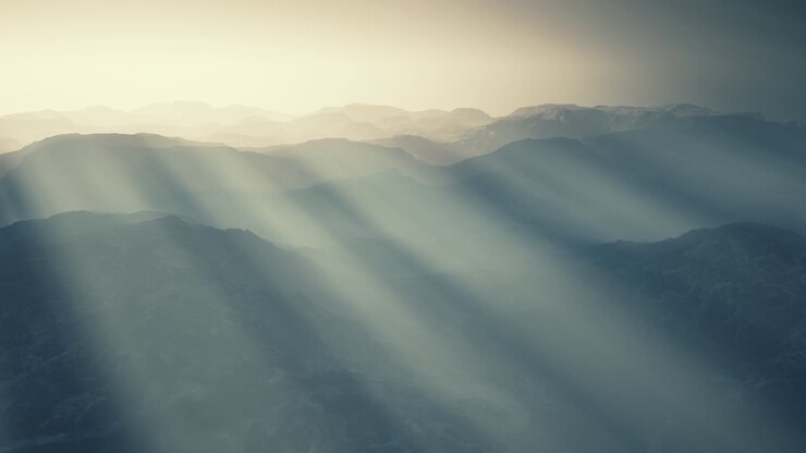 black rocky mountain silhouette in deep fog