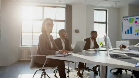 diverse business professionals collaborating in a modern office meeting