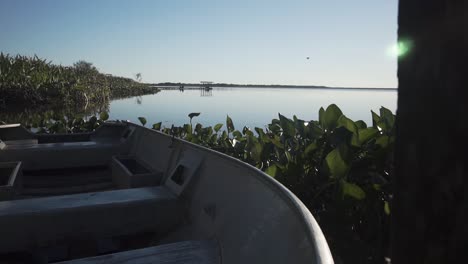 landscape of laguna blanca with empty boat in foreground