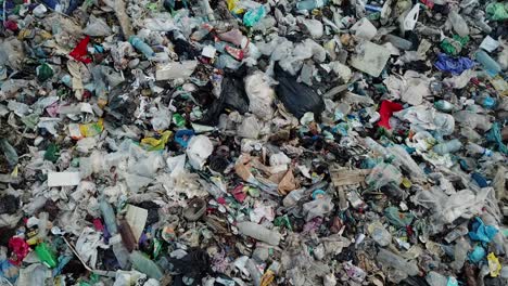 plastic in the mountains mountain garbage large garbage pile degraded garbage plastic in the mountains mountain garbage large garbage pile degraded garbage pile of stink and toxic residue these garbage come from urban areas industrial areas consumer society cause massive