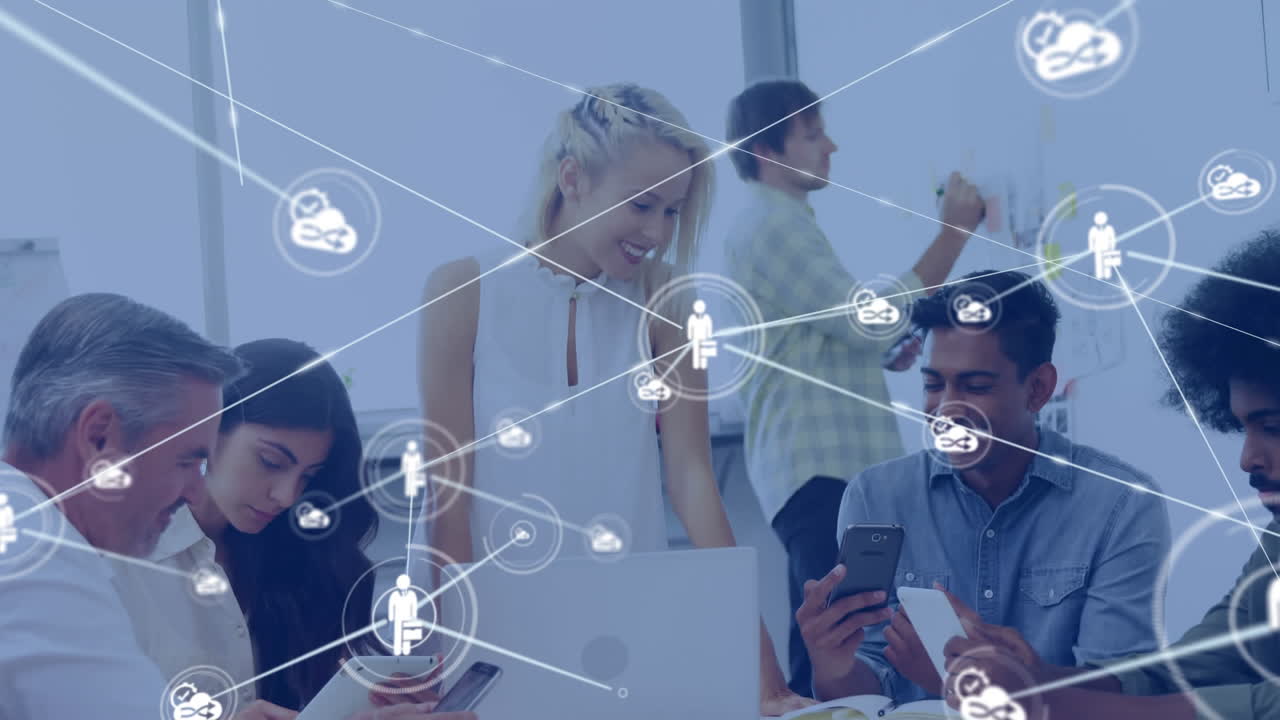 Network of connection icons against office colleagues using electronic devices
