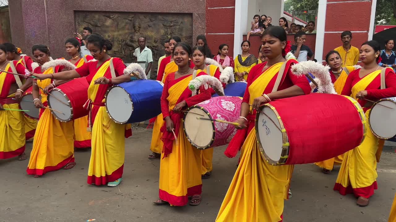 Bengali women traditional drummers rehearsing before performance at Red Road in Kolkata, India.