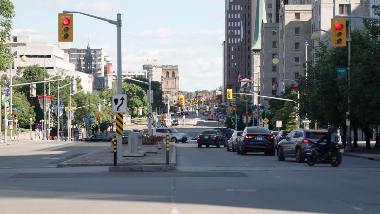 Shot of Elgin street in downtown Ottawa, Canada on a sunny summer day before Canada Day 2022 - 4K slow motion