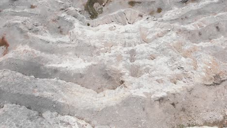 Aerial-view-top-down-view-empty-quarry-steps-industry-sunny-day