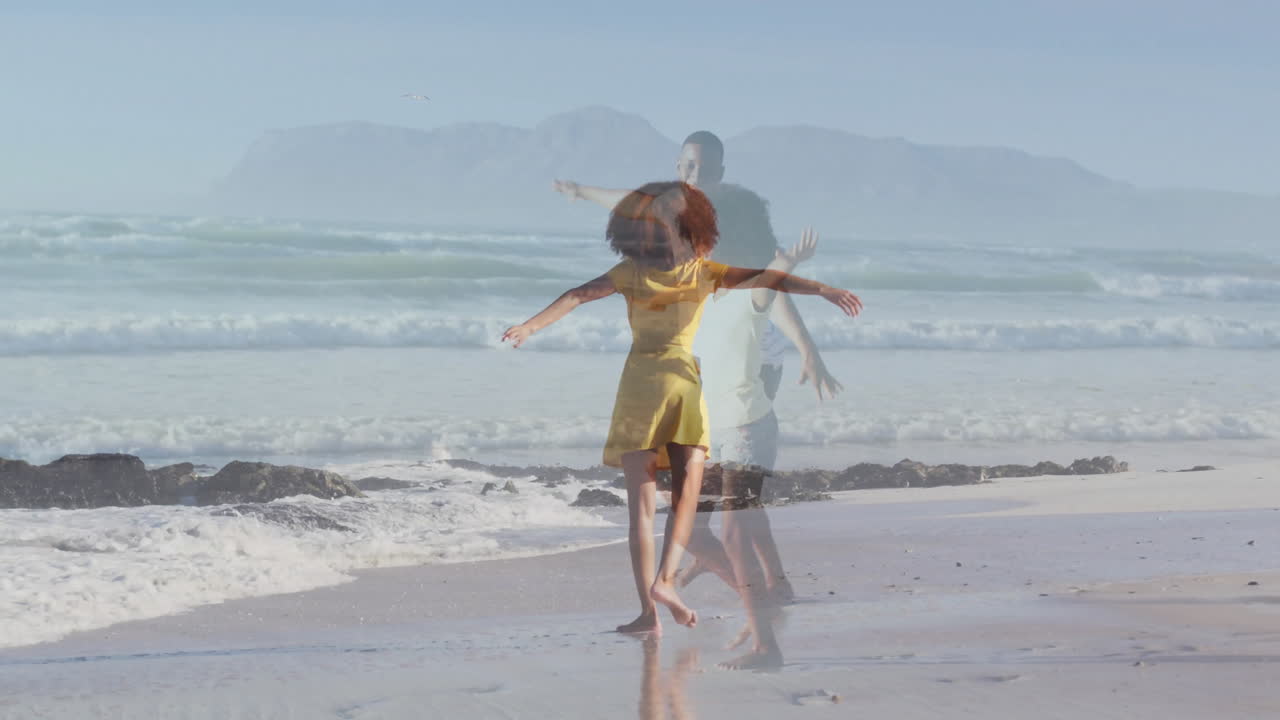 couple dancing on sandy shoreline, with animated heart icon and health data graphs