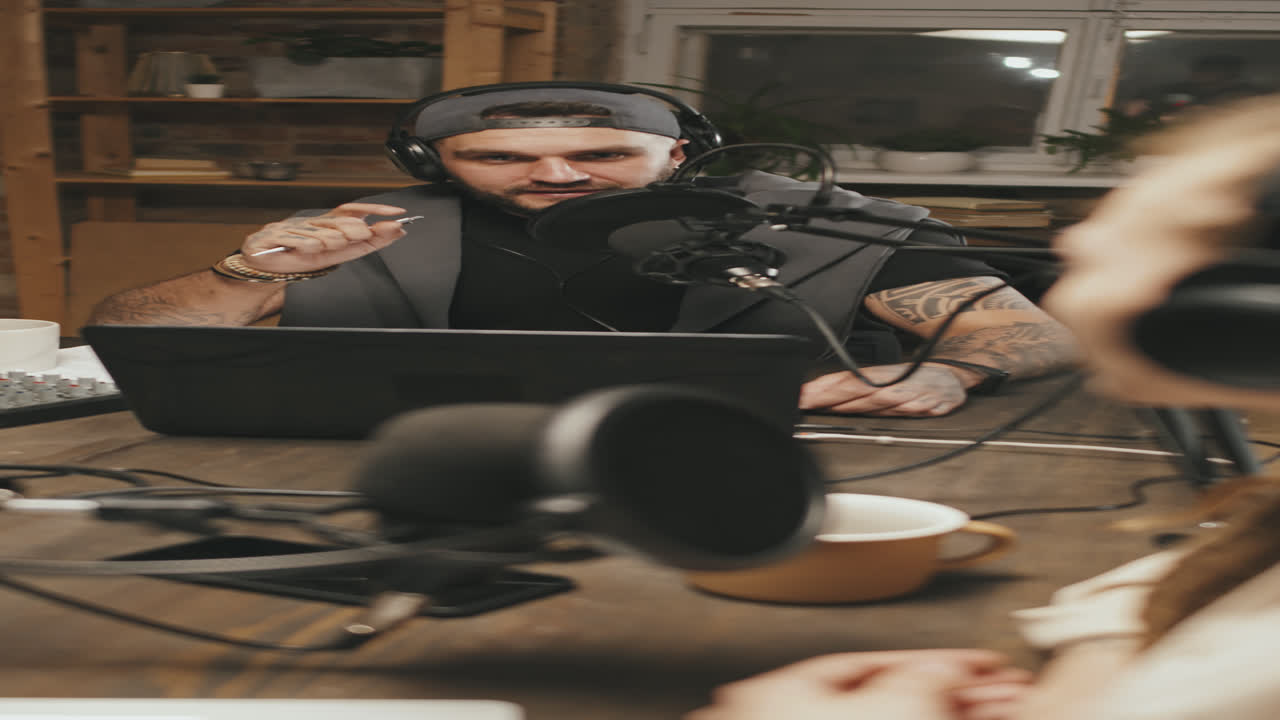 Vertical Shot of Podcast Hosts Having Discussion