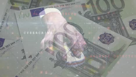 animation of changing numbers and virus alert over hand using mouse and euro banknotes