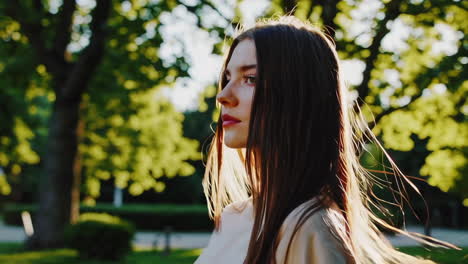 woman in a park at sunset
