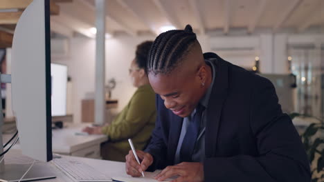 Computer,-typing-and-a-business-man-writing-notes