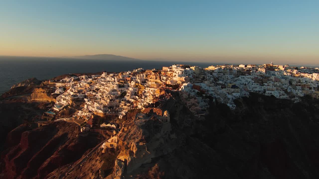 4K cinematic drone footage of Oia, Santorini at sunset - Greece_04