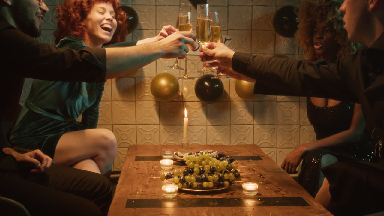 Friends celebrating New Year with champagne toast