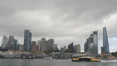 a ferry passes by the sydney cbd in australia