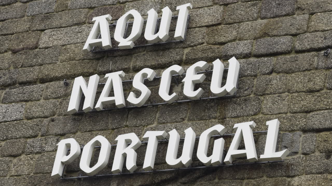 Aqui Nasceu Portugal Sign on Stone Wall