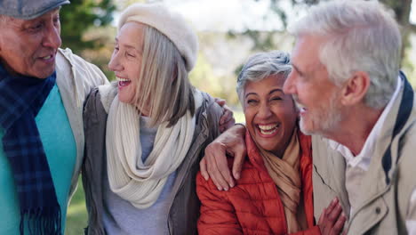 group of senior friends laughing together