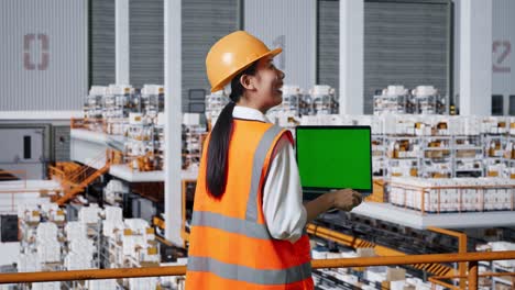 warehouse worker using laptop