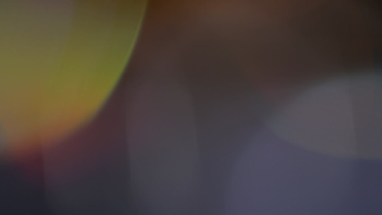 la luz filtra imágenes de 4k, superposiciones de bokeh con brillo de lente, fondo de llama quemada, efecto de rayos de destello