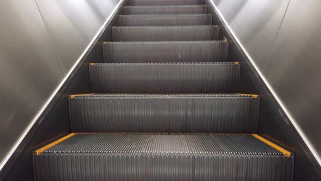 View-while-on-the-escalator-moving-to-the-platform-in-train-station