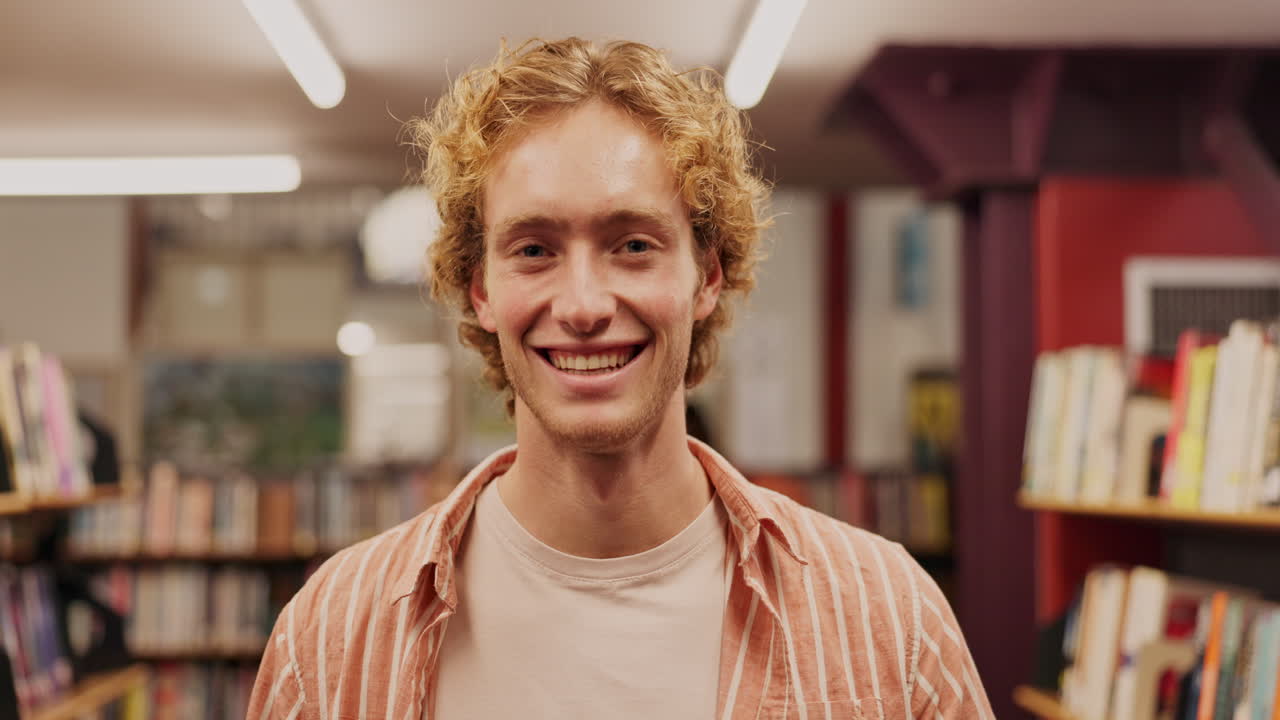 Portrait of a smiling man in a library
