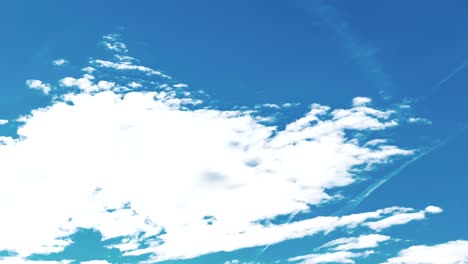 loop of white clouds over blue sky