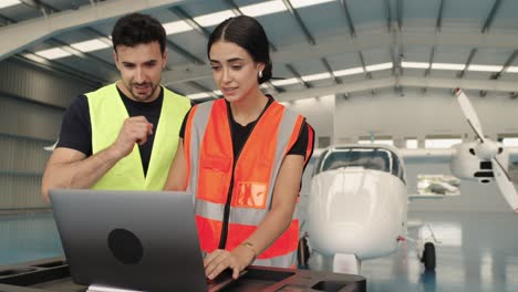 Aircraft maintenance team working in hangar