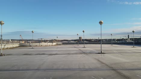 empty parking garage with lamp post during covid-19 pandemic outbreak in gothenburg, sweden