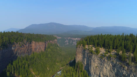 aerial of beautiful cliff and forest 4k