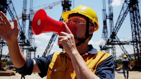 construction worker giving directions on a construction site