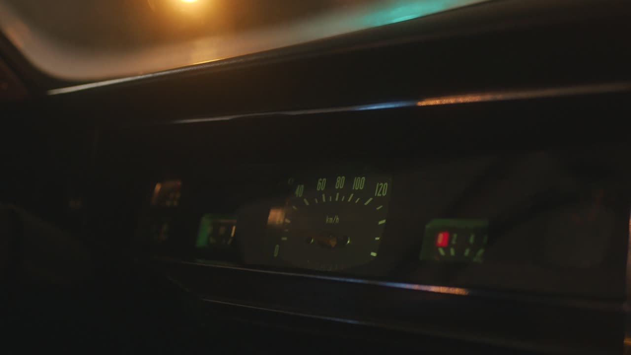 Vintage Car Dashboard at Night