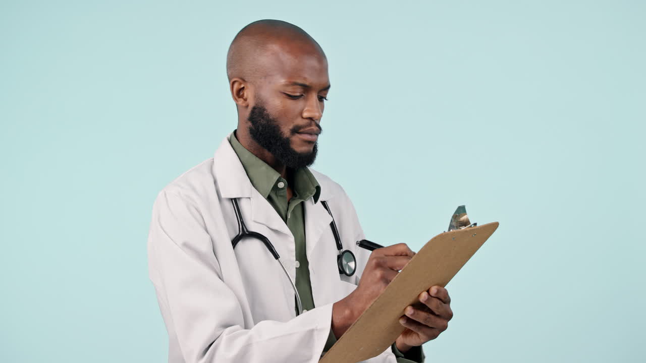 Black man, doctor and writing on clipboard
