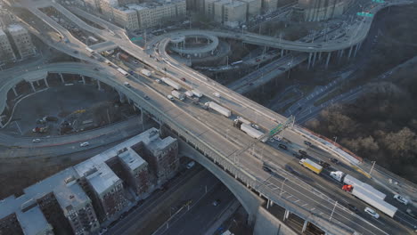 aerial view of rush hour traffic on a new york city freeway. shot at sunrise in washington heights.