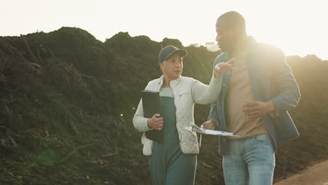 inspector, people and farmer walking