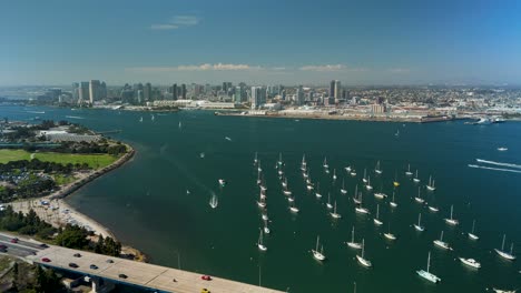 Anchored-Sailboats-Over-San-Diego-Bay-Near-Coronado-Bridge-In-San-Diego,-California,-United-States